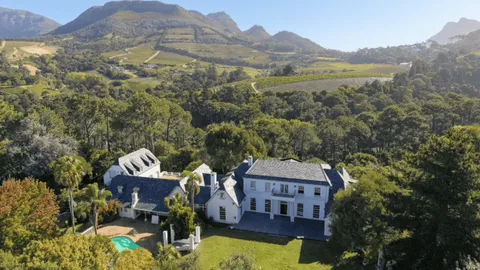 A Large-Scale Estate with Multi-Use Potential On Auction: 99 Southern Cross Drive, Bel-Ombre, Constantia