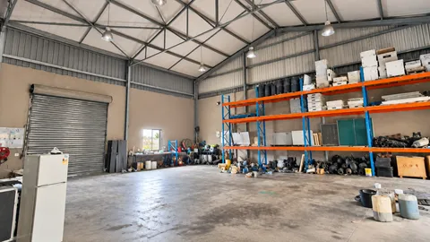 Bright Industrial Warehouse Workshop.png