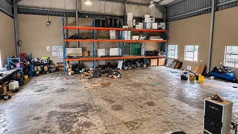 Bright Industrial Workshop Interior.png