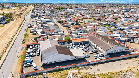 Income-Producing Industrial Site with Large Yard On Auction: 410 Clive Street, Philippi, Cape Town